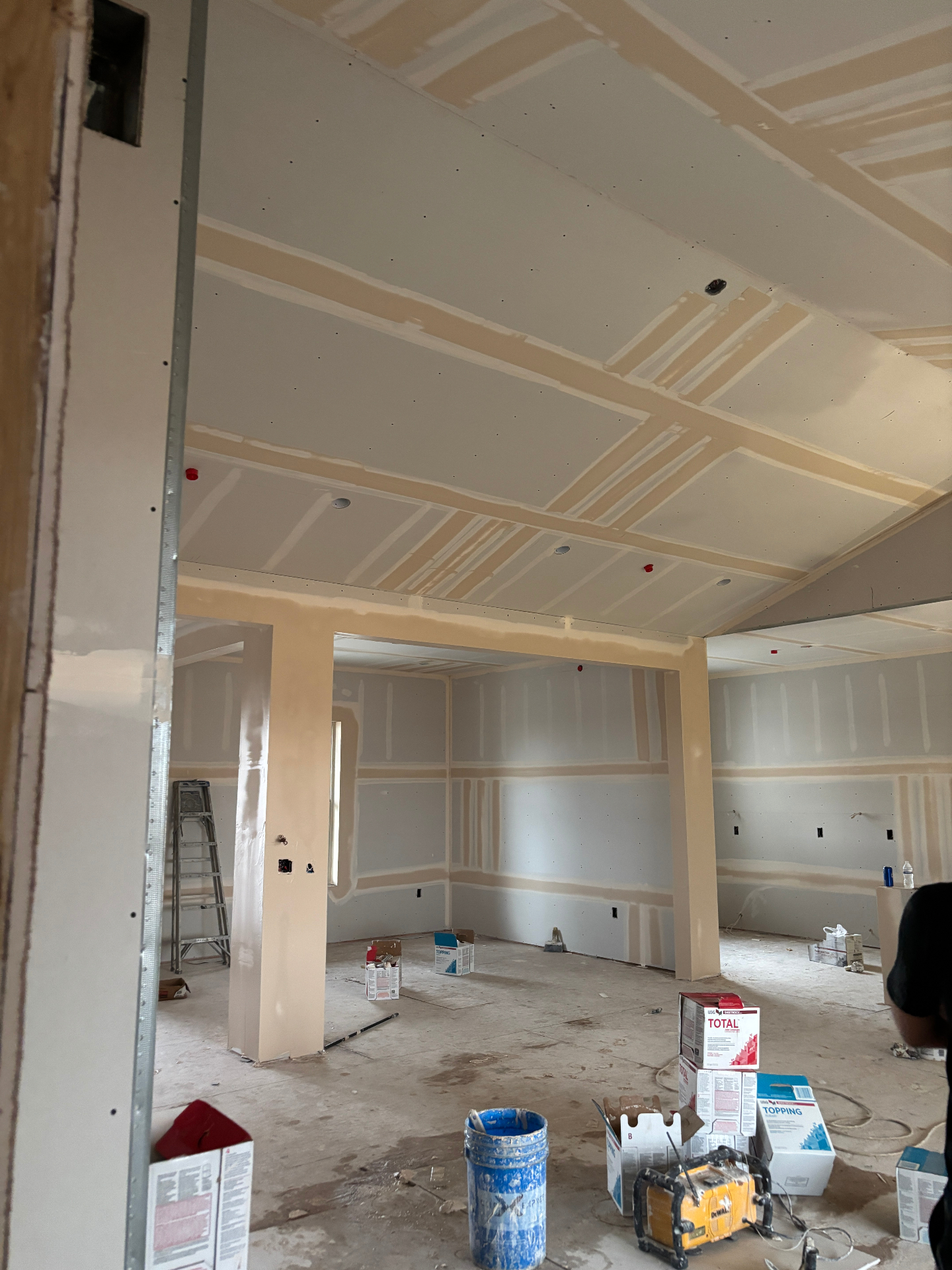 Ceiling & Soffits — Taping in Progress